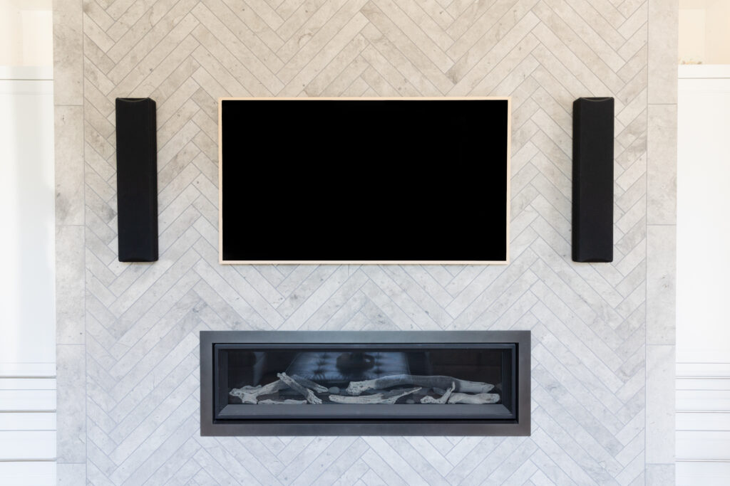 frame TV with fireplace and speakers